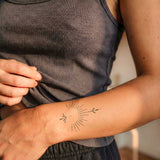 Spirituelle Sonnenstrahlen Tattoo