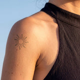 Kleine Boho Sonne Tattoo