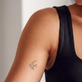 One Line Fisch Tattoo