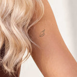 One Line Meeresmuschel Tattoo
