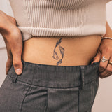 Gegenüberliegende Fische Tattoo