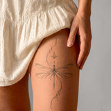 Fließende Libelle Tattoo