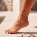 Kleine Ornament Sonne Tattoo