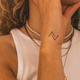 Offene Dreiecke Tattoo