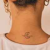 Mond und Welle Tattoo