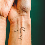 Abstraktes Gesicht Tattoo