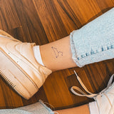 Löwe Konstellation Tattoo
